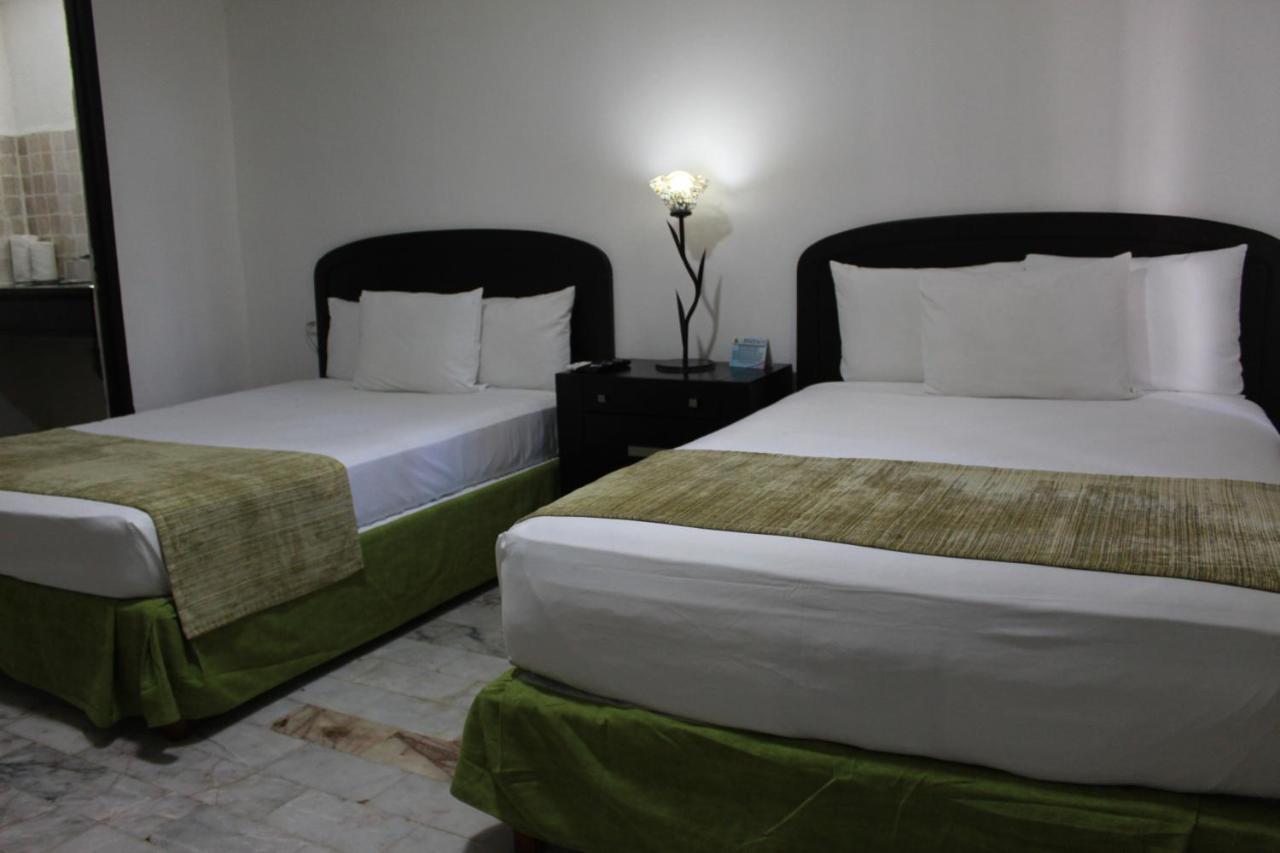 Hotel Green 16 Cancun Bagian luar foto
